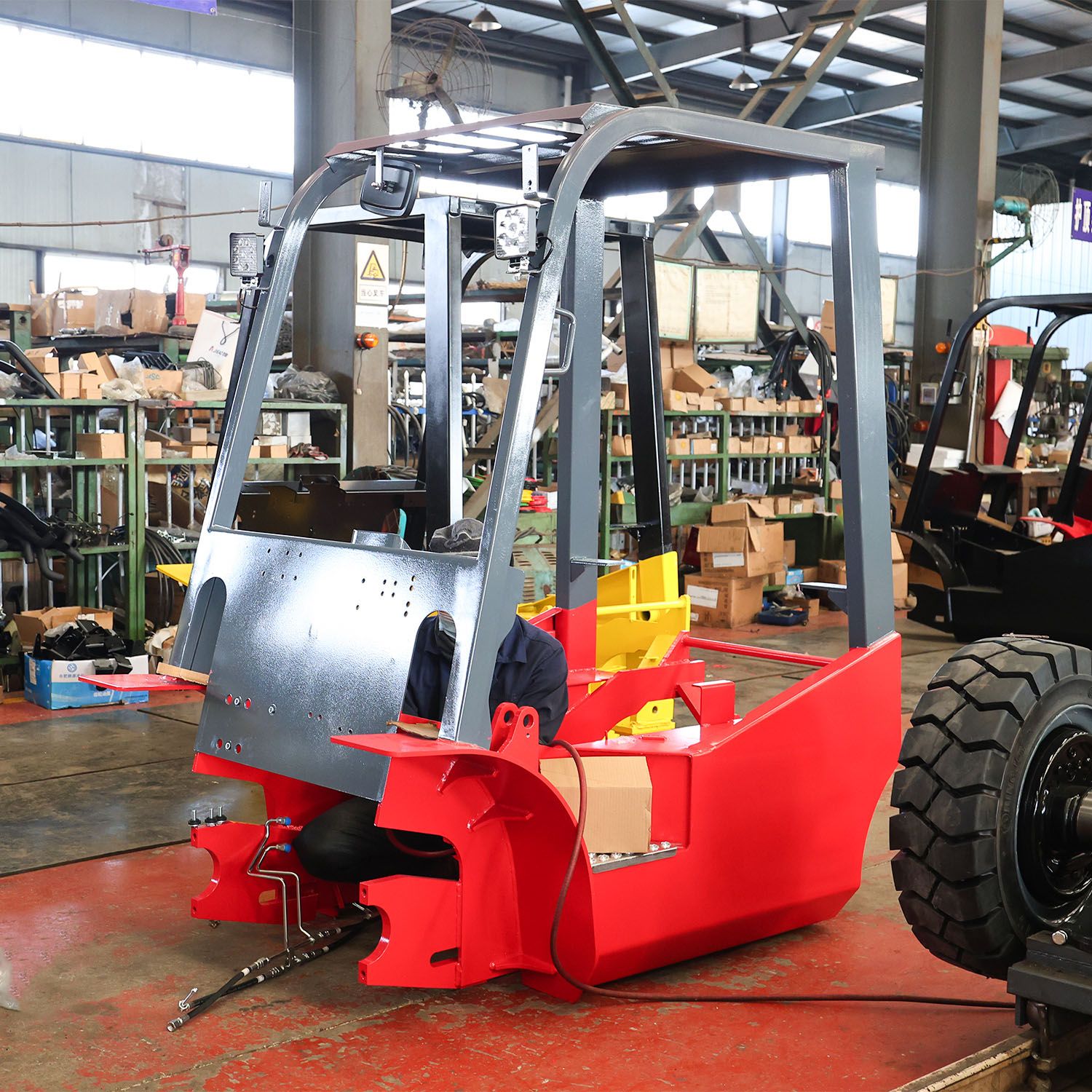 Forklift chassis and overhead guard on production line